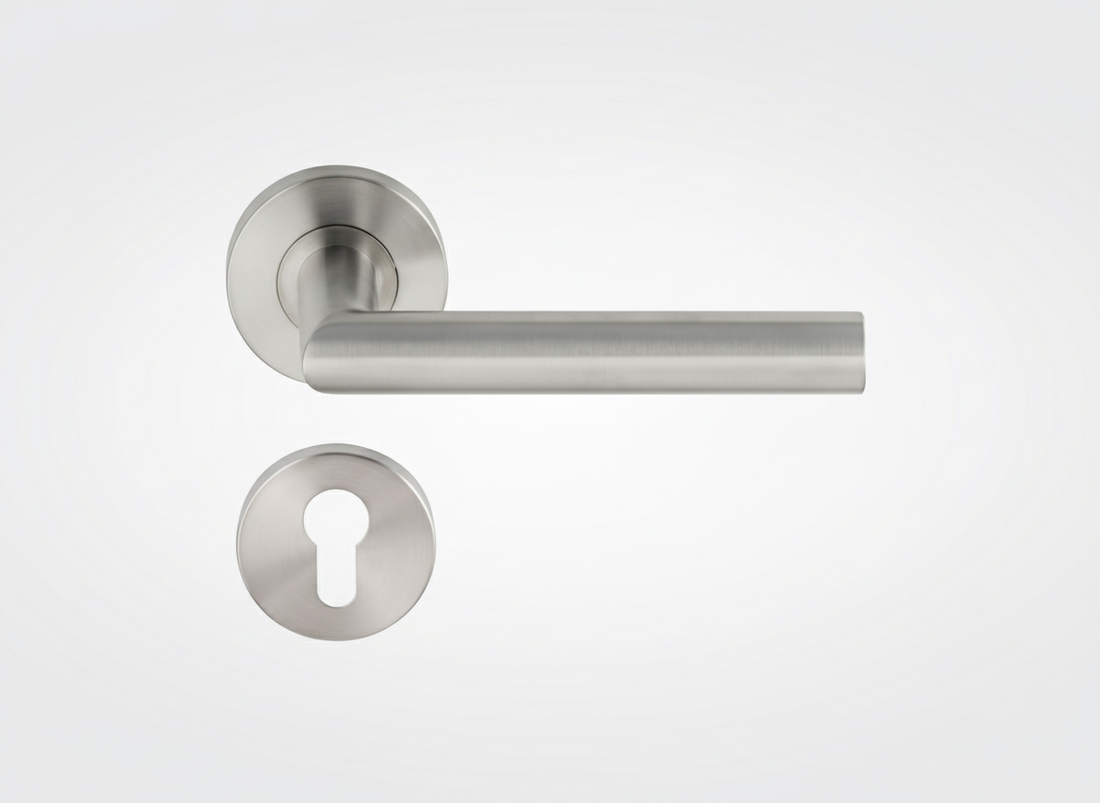 Brushed stainless steel door handle with PC rosette