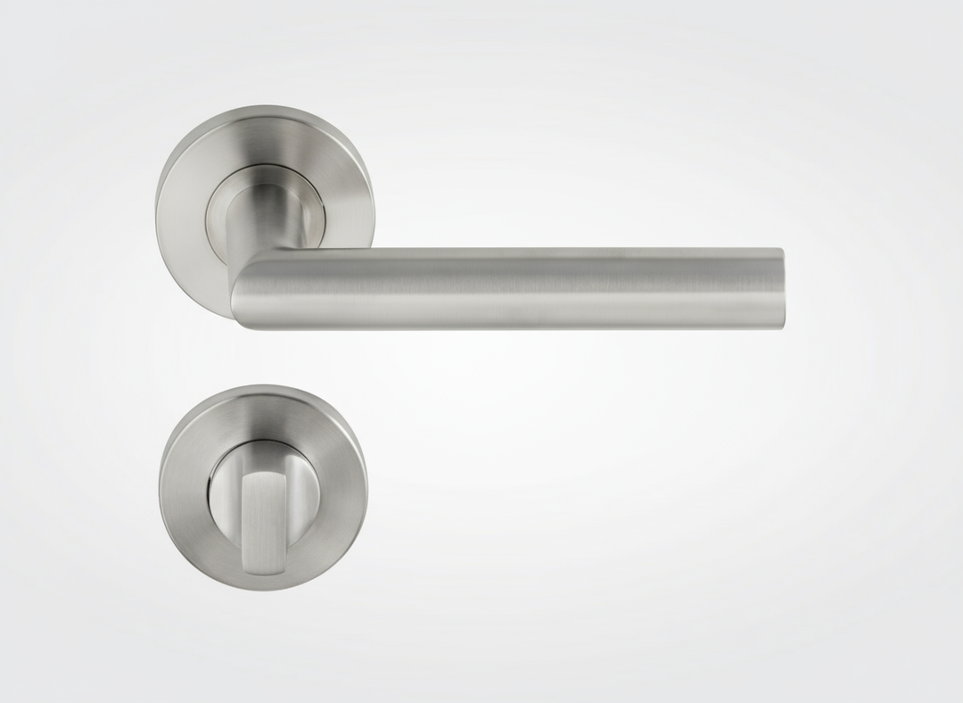 Brushed stainless steel door handle with privacy indicator rosette